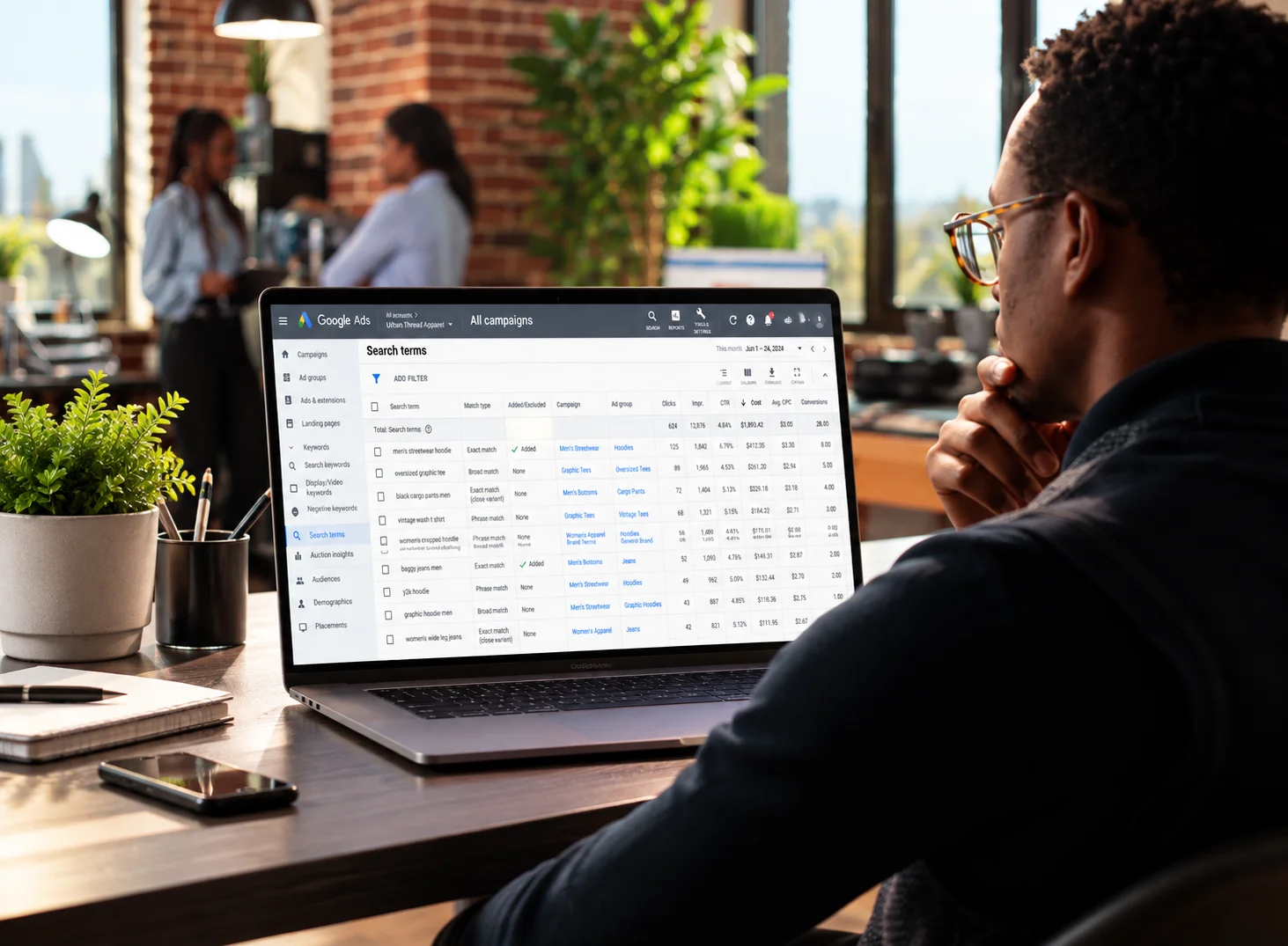 Worker looking at google analytics dashboard on his laptop. This is to show people what we work on for our Google Ads for Ecommerce Service.